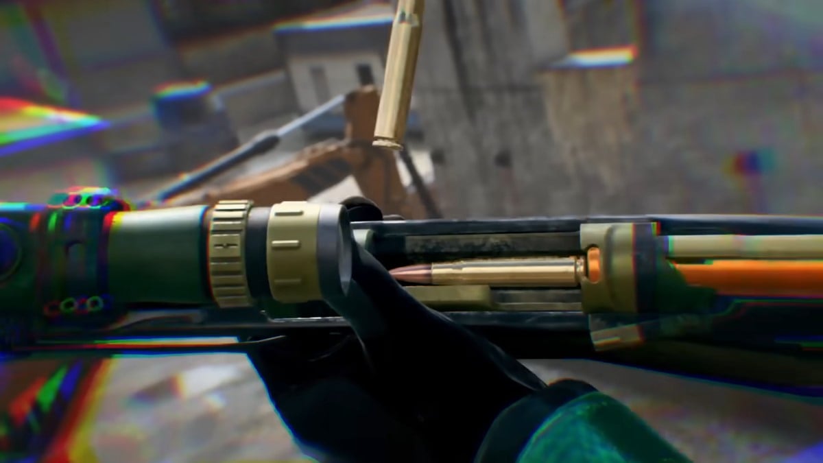 Image has bullets in casing visible with the reloading of a rifle taking place. There is a chromatic aberration effect around the border of the image.