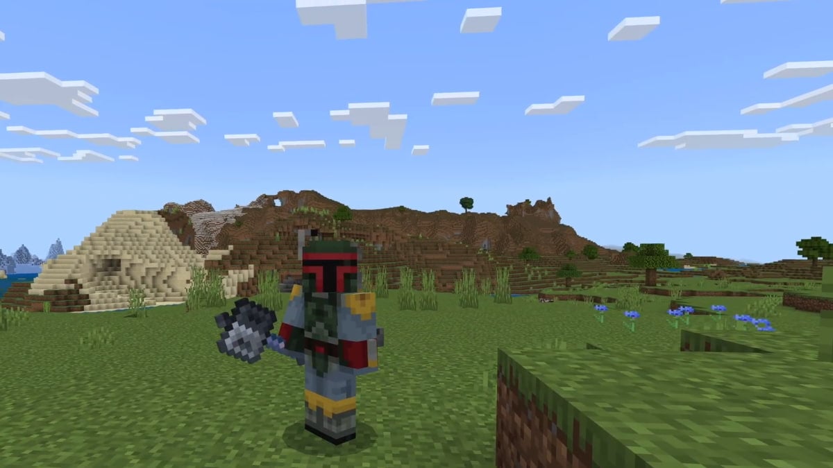 A player in Minecraft holding a mace.