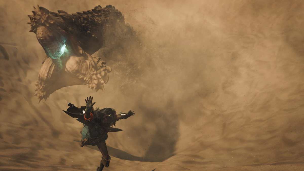 A hunter falls into a sandpit as a Balahara attempts to snap at them.