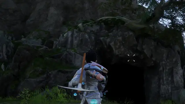 A player in Palworld outside a cave on Sakurajima Island.