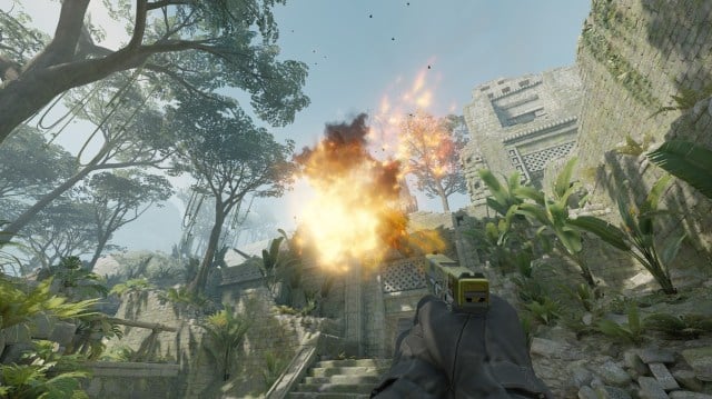 A Molotov explodes in front of a player on Ancient in Counter-Strike 2.
