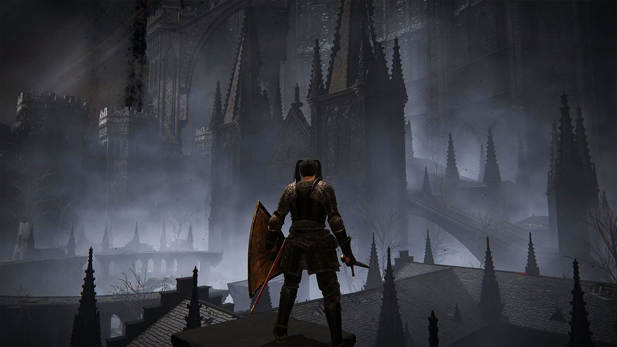 Elden Ring character looking out over the Church District in the DLC