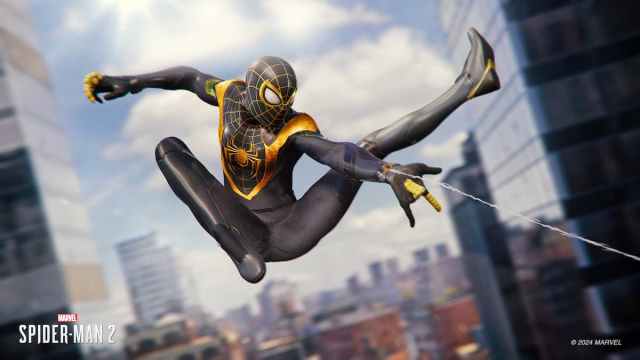 Spider-Man swinging through the city.