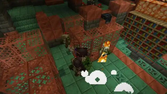Combattre avec une masse d'aspect feu qui a mis le feu à un ennemi dans Minecraft.