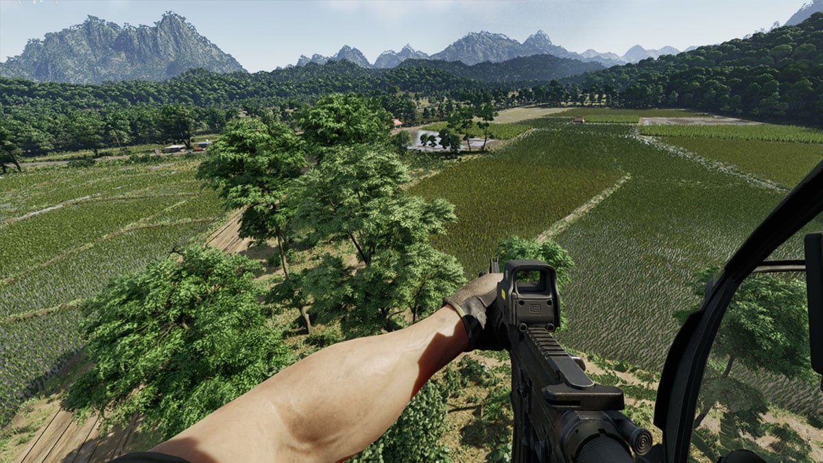 A player rides a helicopter over a forest and farmland in Gray Zone Warfare.