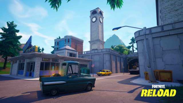 An image of the area tilted towers in fortnite, featuring a green truck, a yellow car, and a big clock tower.