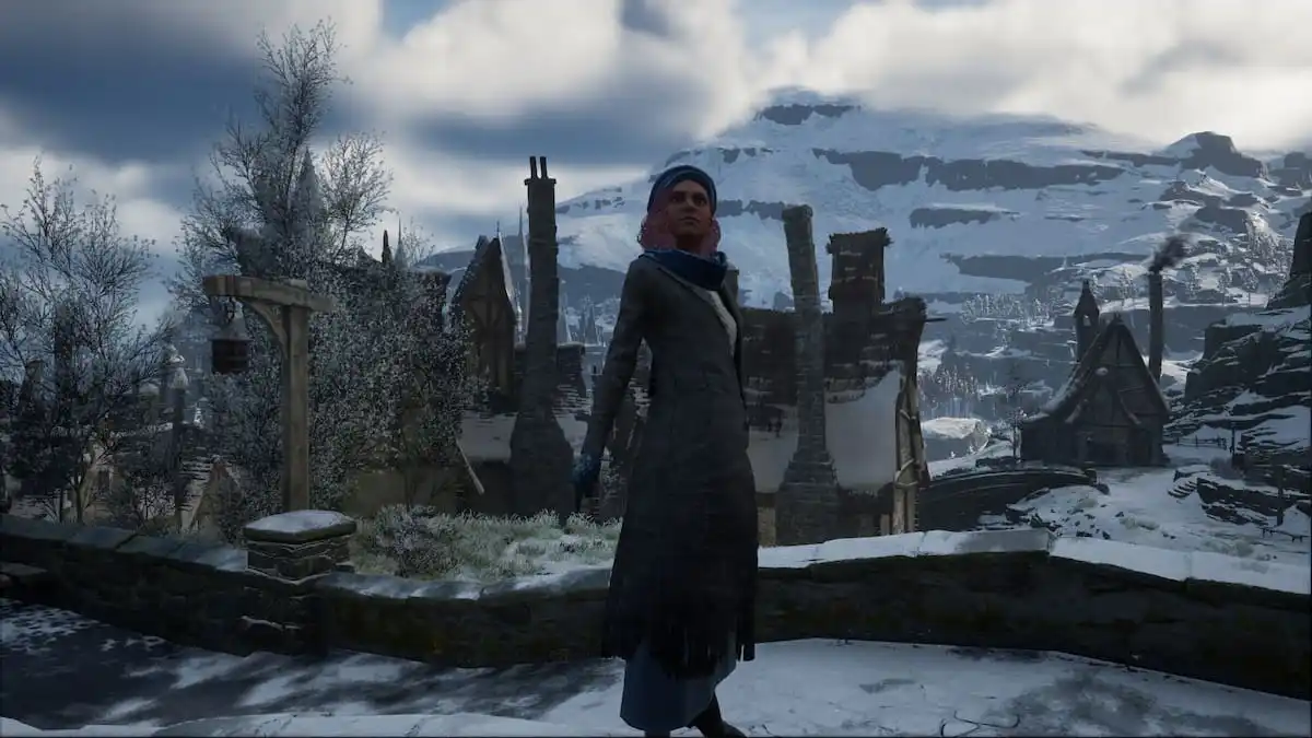The player standing on a bridge looking up during winter in Hogwarts Legacy.