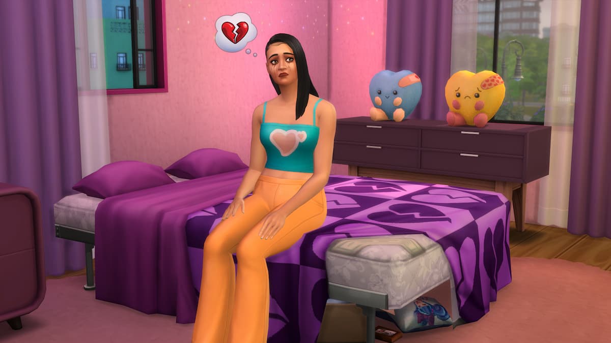 Sim sitting on a bed heartbroken.