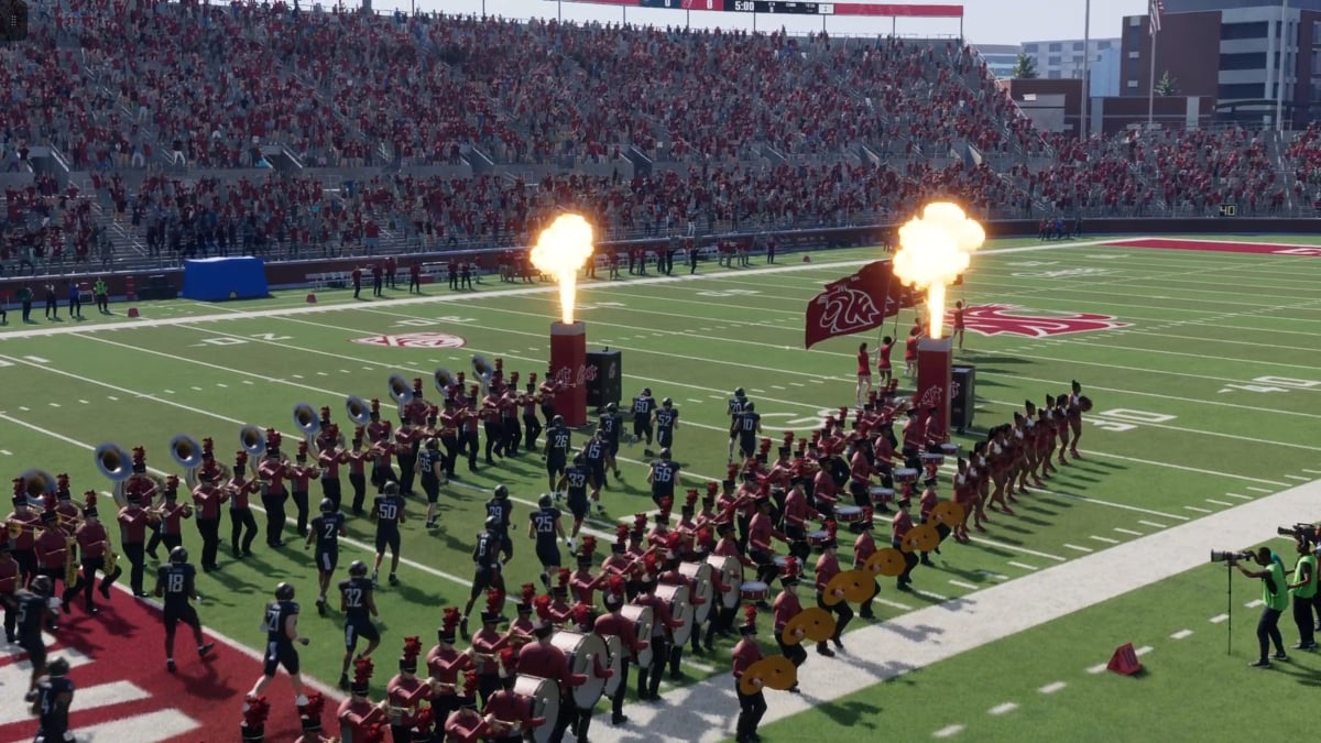 Washington State players entering the field for a game.