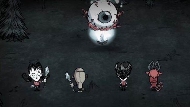 An image from Don't Starve Together of four players facing off against the Eye of Terror.