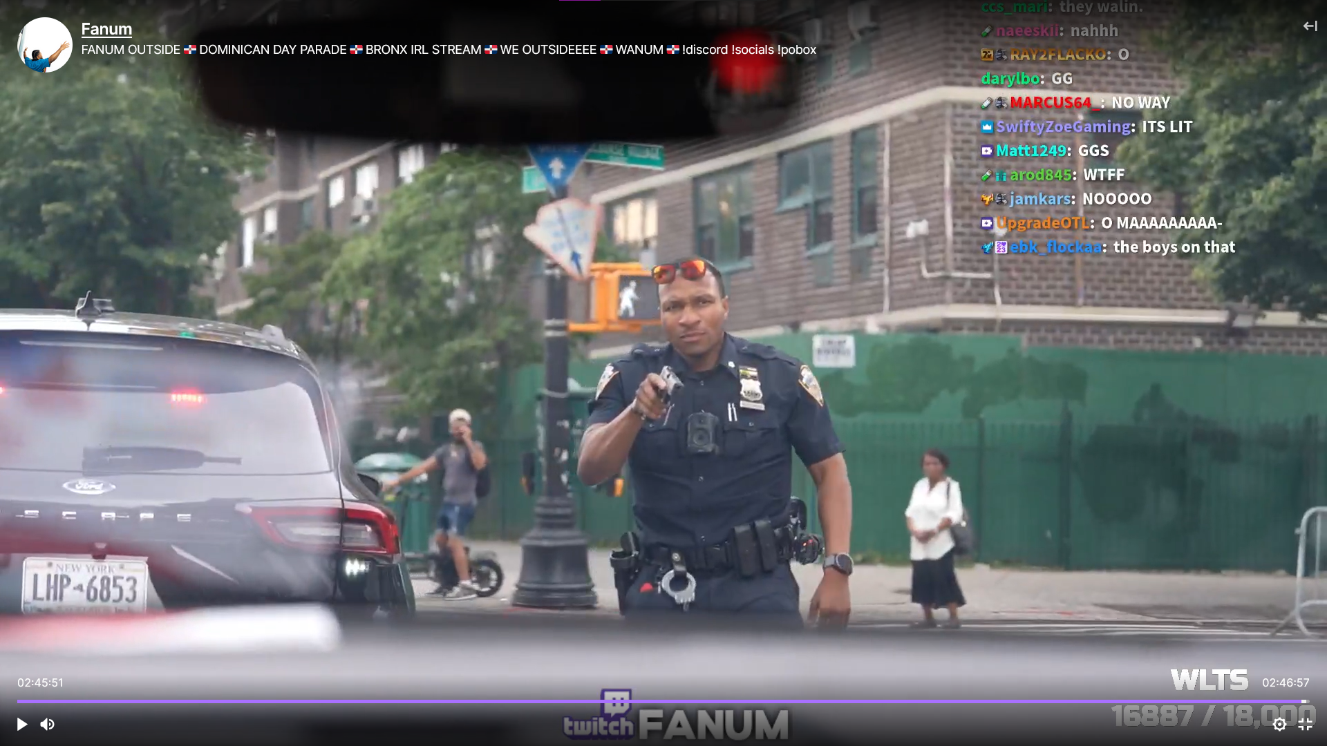 Screenshot of a police officer approaching Fanum's car from his livestream.