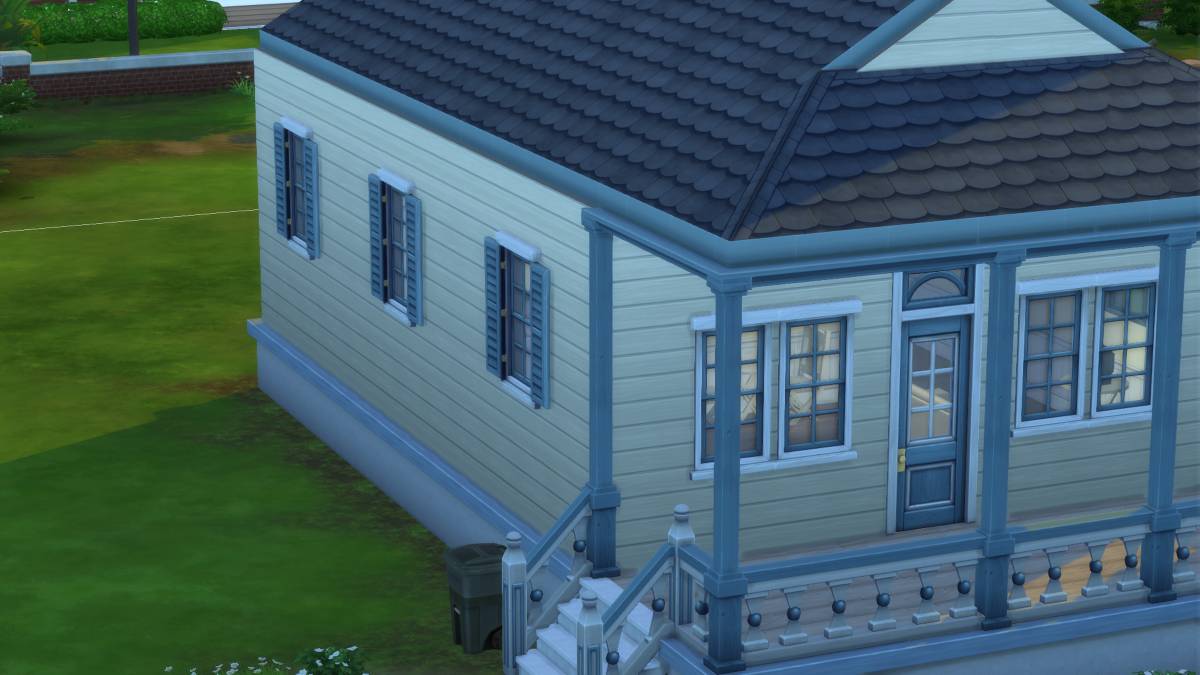 Close up side shot of a small house in The Sims 4