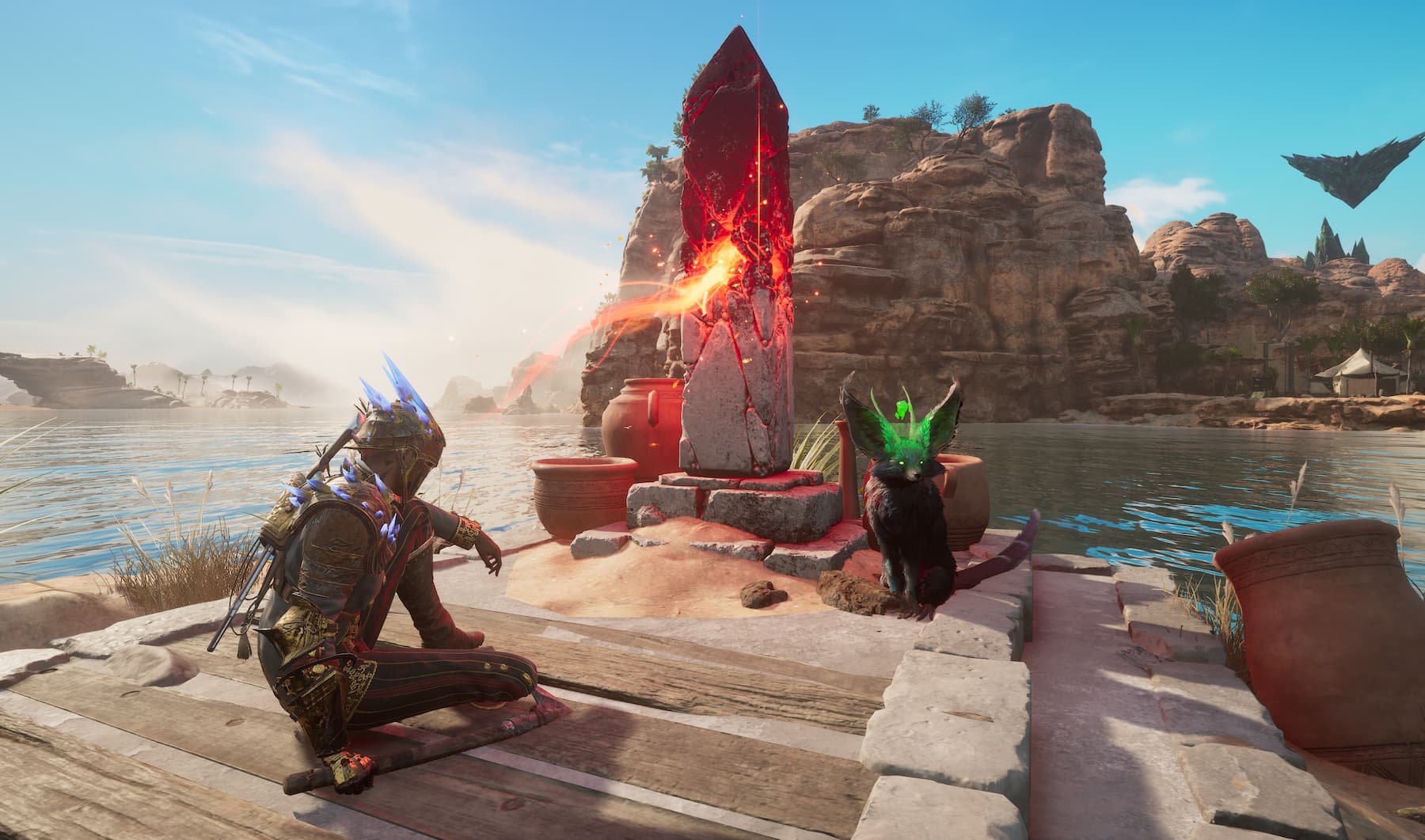 A screenshot from Flintlock showing a red and beige pillar emitting a red glow while Nor and Enki sit nearby.