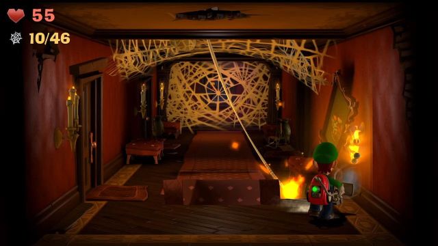 Luigi lighting a spider web fuse