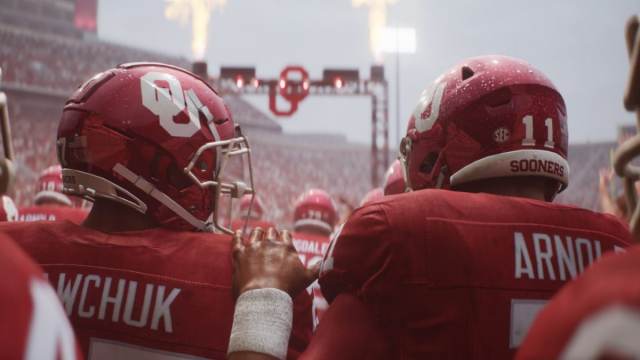 Oklahoma players exiting the tunnel in College Football 25.