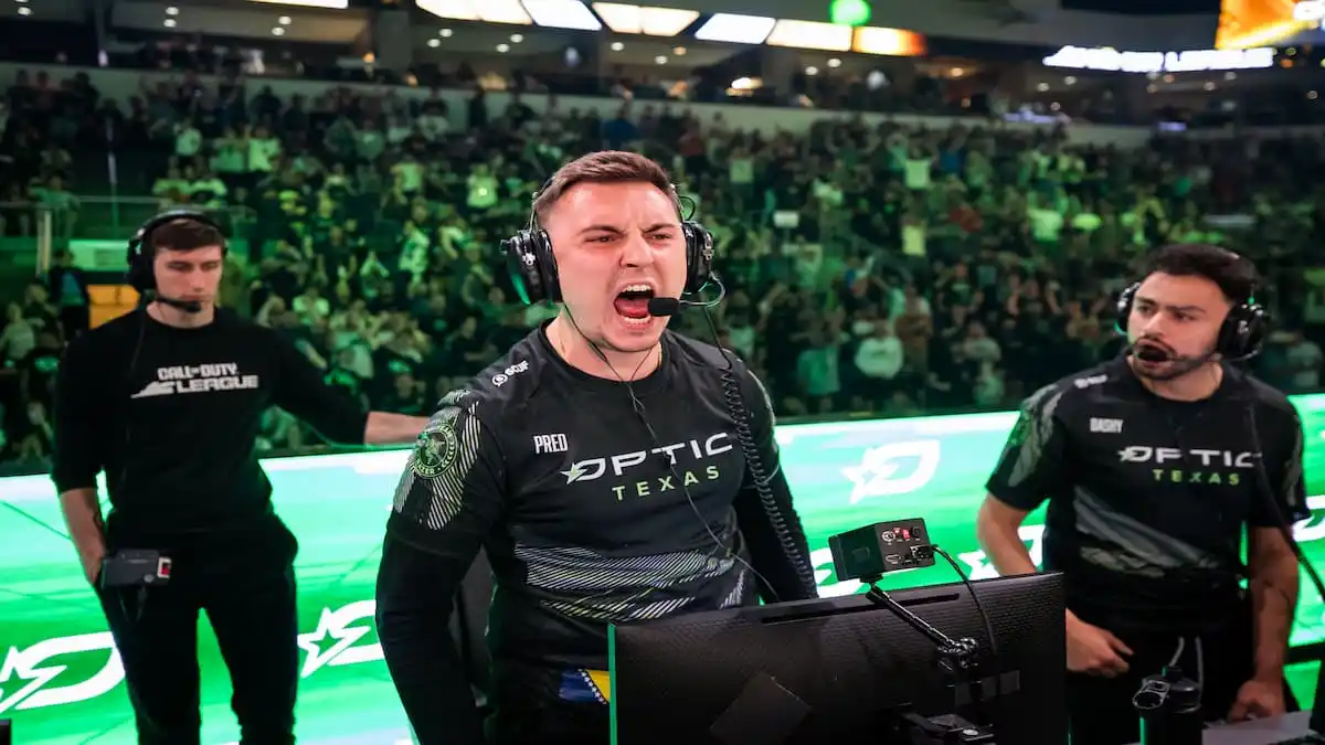 OpTic Pred yelling into his mic on stage at CoD Champs 2024.