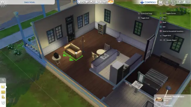 Selecting and rotating a couch inside a house in The Sims 4
