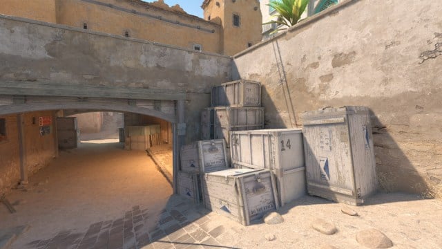 The new crates on Dust 2, allowing players to self-boost onto short in CS2.