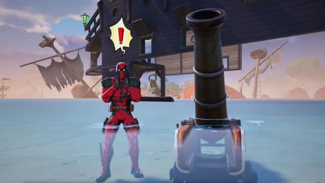 Deadpool standing by a Cannon in Fortnite.