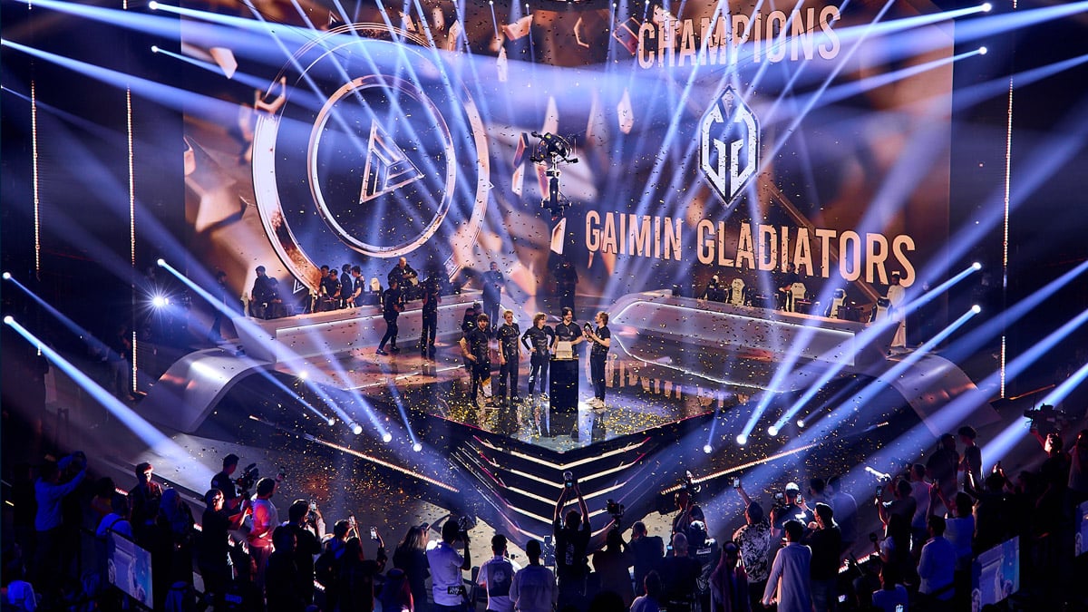 Gaimin Gladiators celebrate on stage after winning EWC 2024.