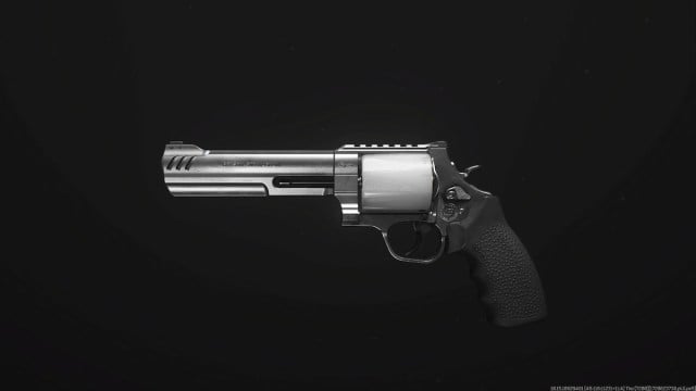 Basilisk handgun on a black background.