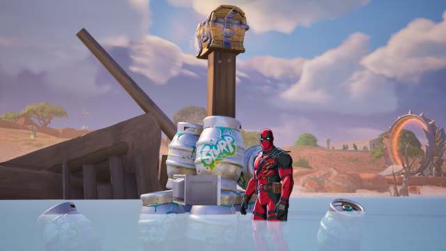 Deadpool standing by a Slurp barrel stack and microwaving a Chimichanga in Fortnite.