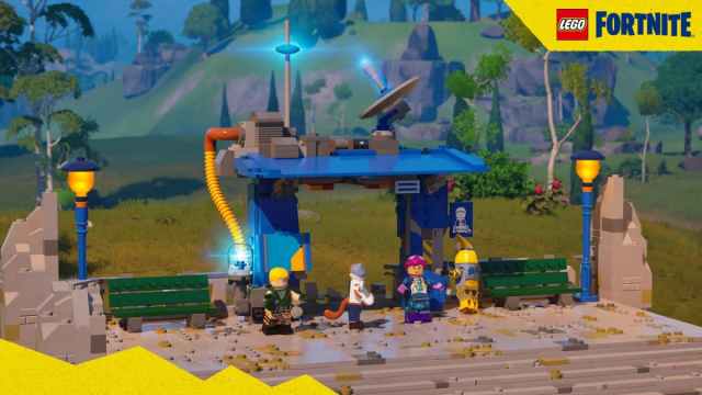 Characters in LEGO Fortnite stood alongside a Bus Station.