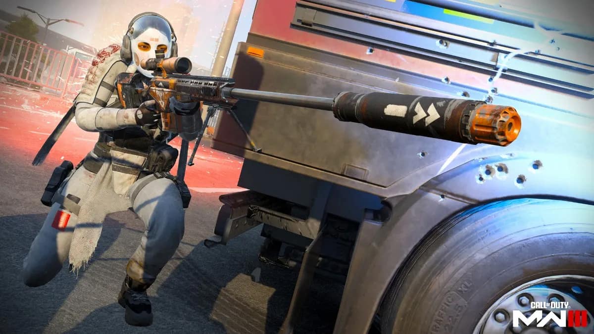 A masked operator aiming down the sights of their weapon with a massive suppressor attached to the barrel.