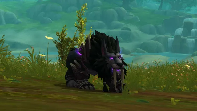 A Feral Druid in cat form, with sabertooth tiger teeth, standing in a field in WoW The War Within