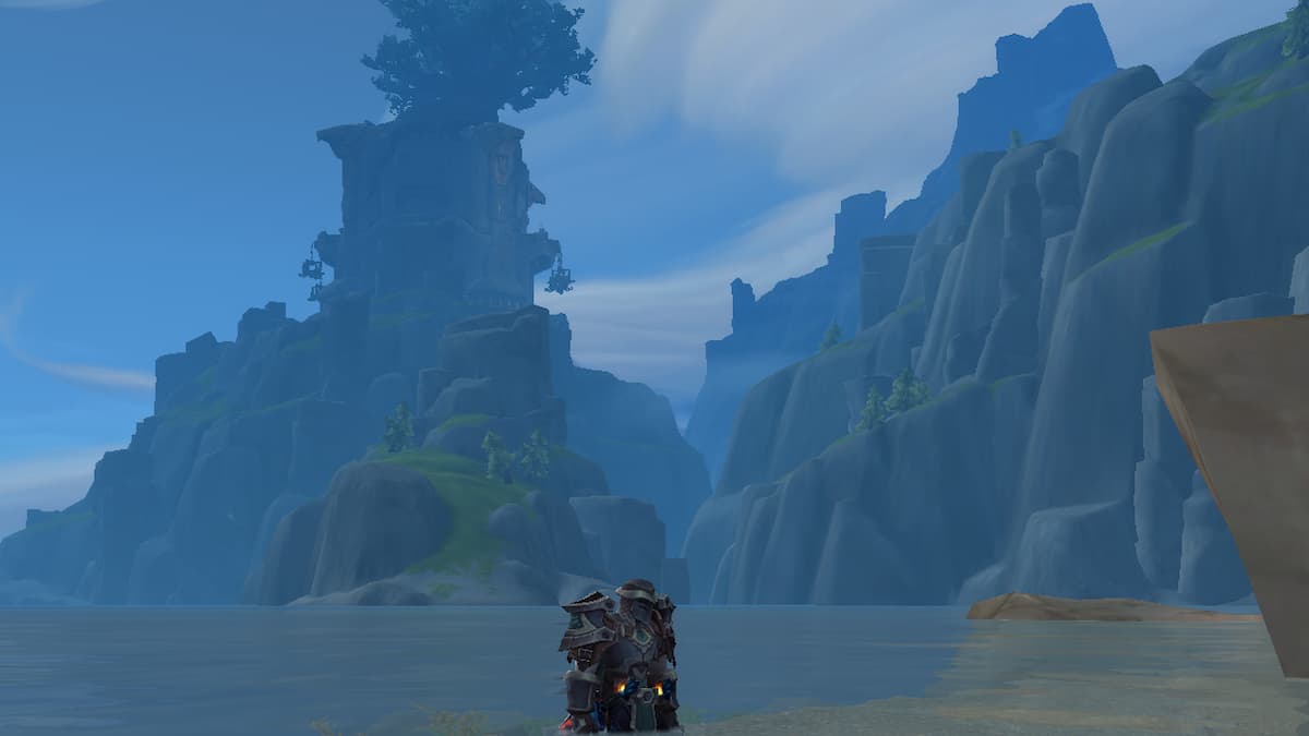 The waters outside Dornogal and mountain peaks in WoW The War Within Isle of Dorn zone