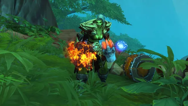 An Enhancement Shaman wielding two fiery maces standing in a field in WoW The War Within