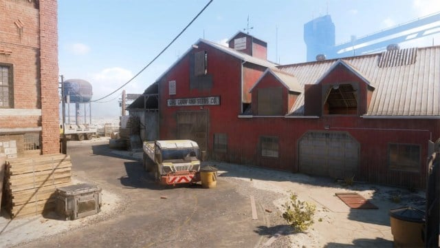 Fringe, a map from Call of Duty, with a red barn sitting outside a small town and road with a broken down truck.