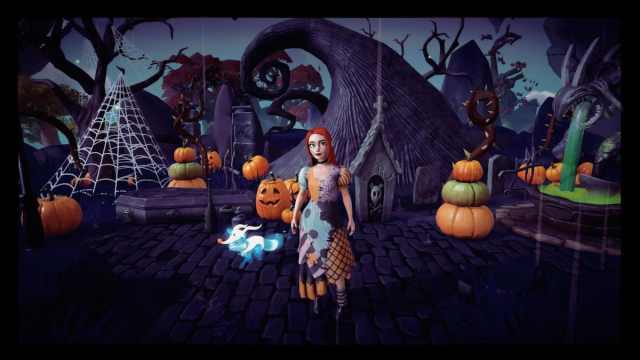 The player dressed as Sally in a patched dress standing by The Nightmare Before Christmas hill in Disney Dreamlight Valley.