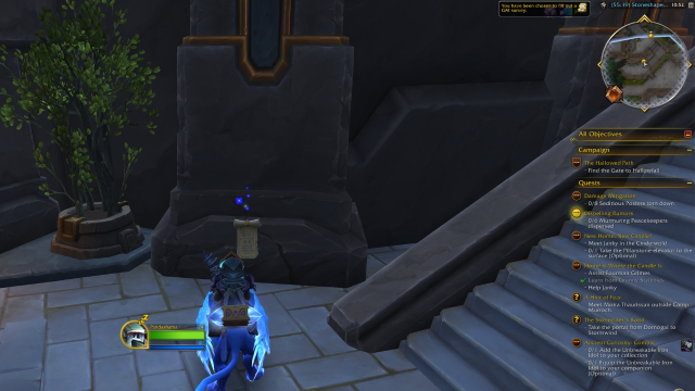 Player standing in front of a seditious poster in wow the war within