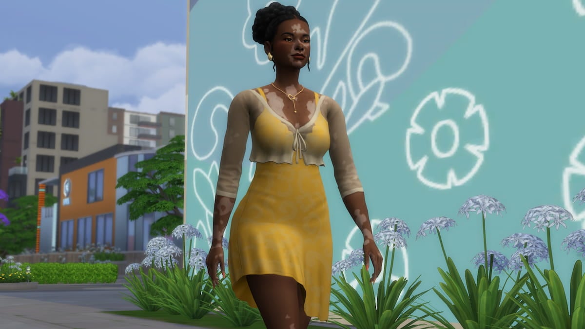 A Sim wearing a yellow dress walking down a city street by some green plants in The Sims 4 Lovestruck.