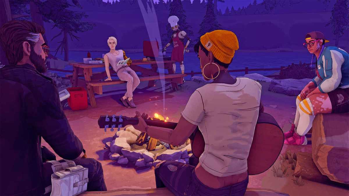 A group of friends sit around a campfire, one is playing a guitar