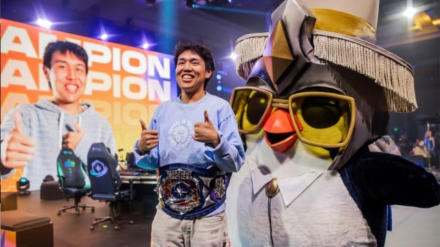 Milala poses with Pengu after victory at the TFT Vegas Open Finals 2023 at the MGM Grand in Las Vegas.