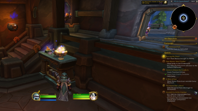 A glowing ball on top of a bookcase in wow the war within