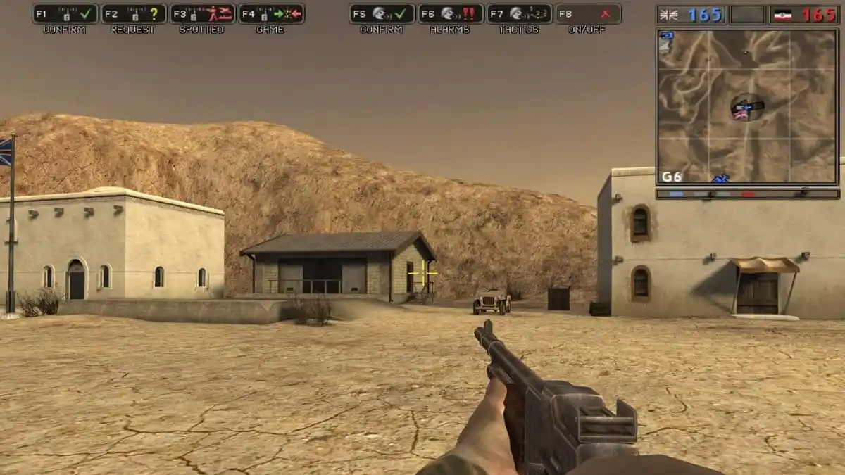 Player character aiming a gun at a house in a desert in Battlefield 1942