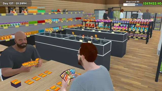 Picture showing the two customers playing cards in TCG Card Simulator.