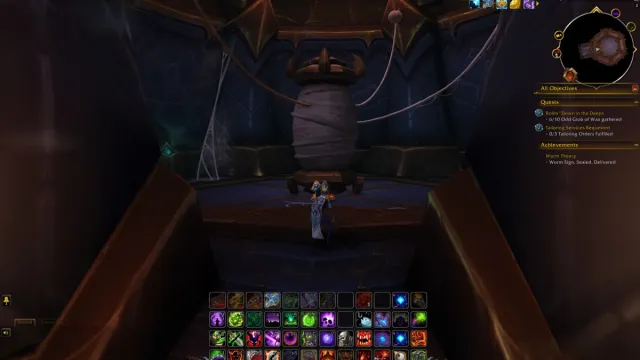 Player standing in front of a big spool of web in WoW The War Within.