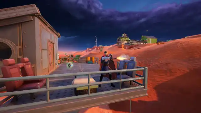 Picture showing the Fortnite player using a building roof to get headshots from above.