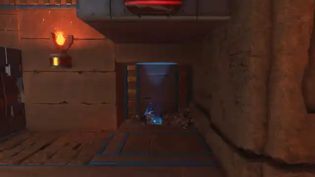 astro bot finds a secret x hideaway behind a block and is about to dig down