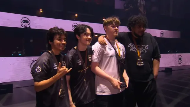 Spacestation Gaming posing for celebratory photos on the ALGS main stage, with Phony, Koyful, Xynew, and Don