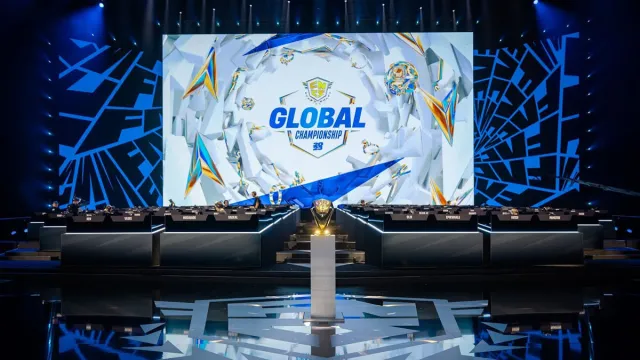 A photo of the main stage of the Fortnite Global Championship with the trophy front and center.