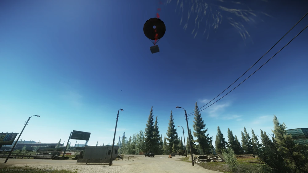 An airdrop crate falls to the ground with a parachute in the middle of the woods and a road in Escape from Tarkov.