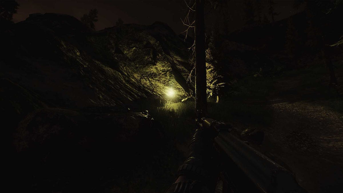 A yellow flare lit up next to a tree while a player holds a weapon in Escape from Tarkov.