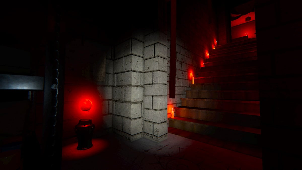 A Totem sitting near the edge of the stairs in the 13 Willow Street basement in Phasmophobia.