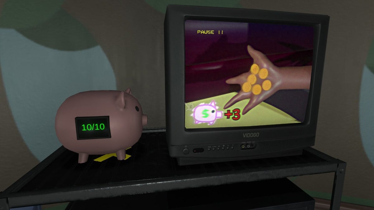 Looking at the piggy bank with 10 out of 10 coins, next to the tv with Amanda holding six coins on screen