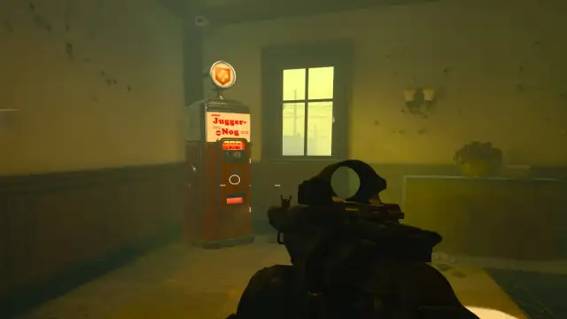 A player in Black Ops 6 Zombies looking at the Juggernog machine.